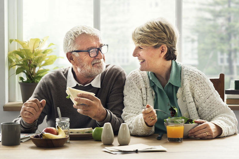 Dental Implant Patients Eating Together In Atlanta, GA